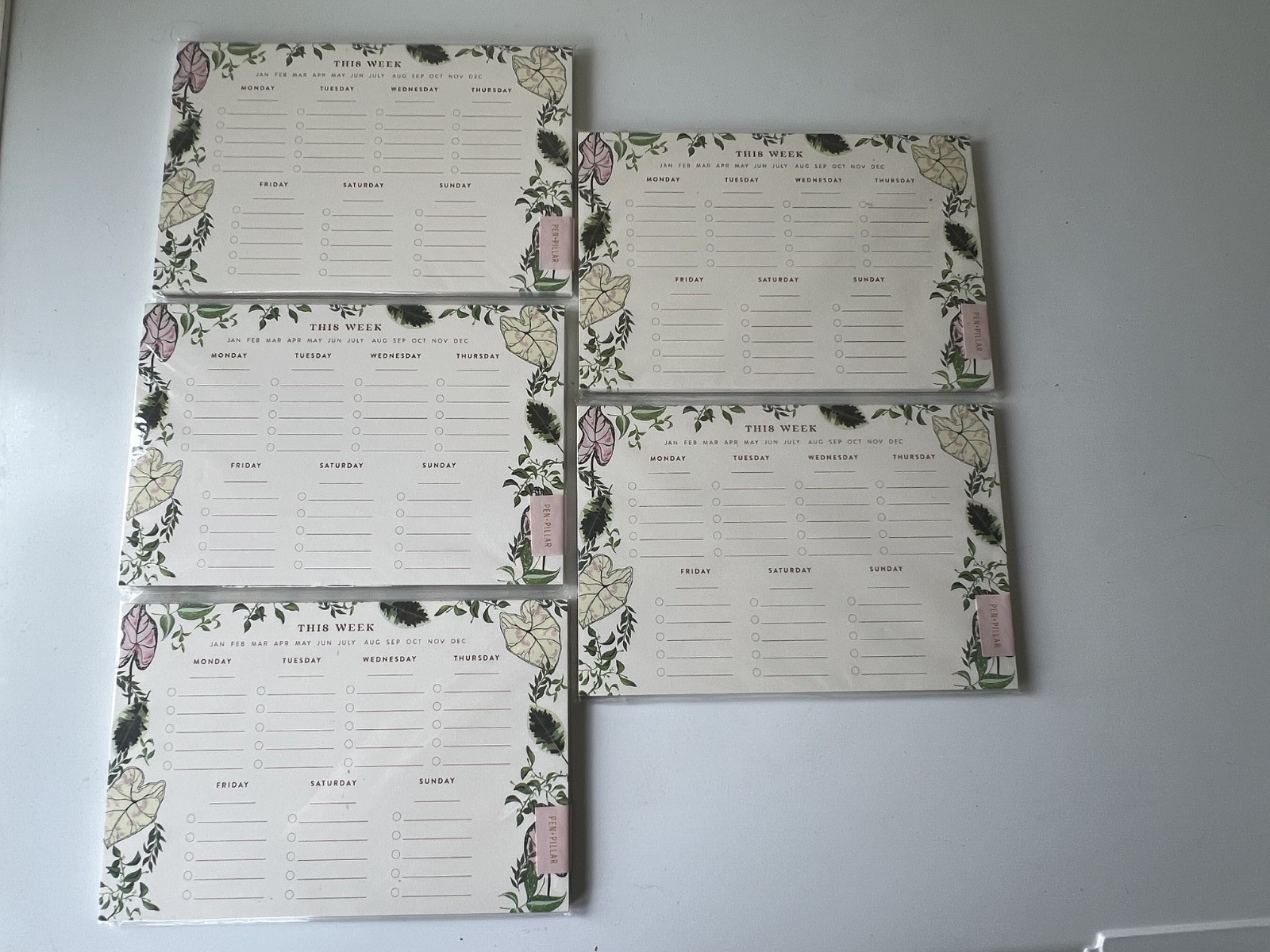 Five Pen and Pillar Weekly Planners (55 sheets each) on Sustainable Paper