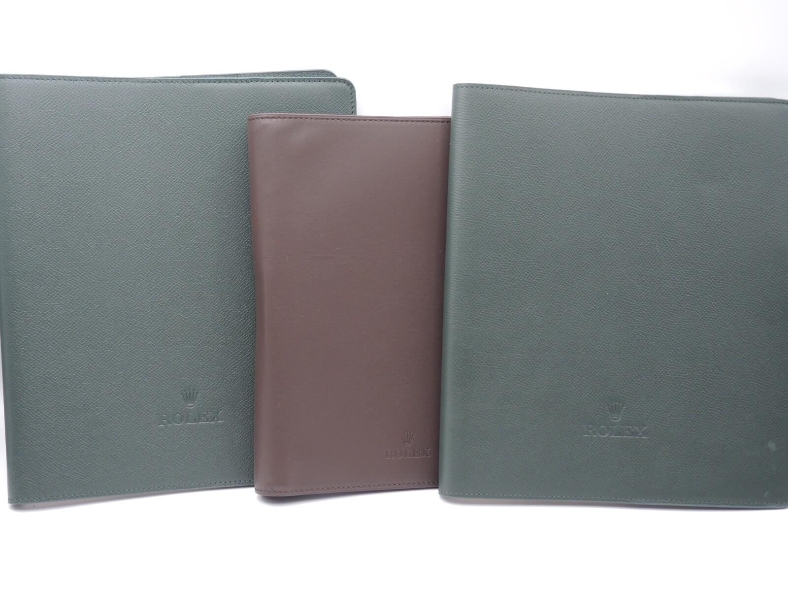 NICE 3PCS. ROLEX GREEN VERDANT LEATHER AND BROWN PADFOLIO W/ CARAN D’ ACHE PEN