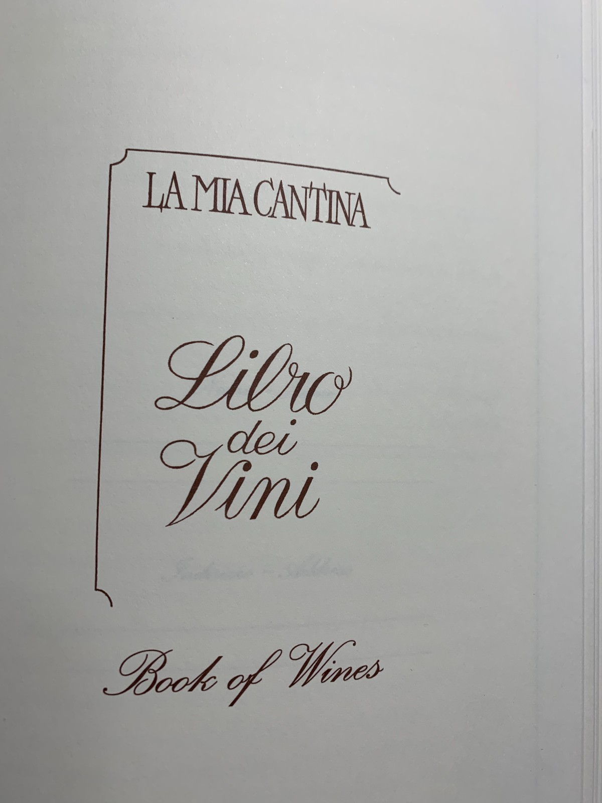 Wine log, journal, with wood and leather cover, made in Italy.