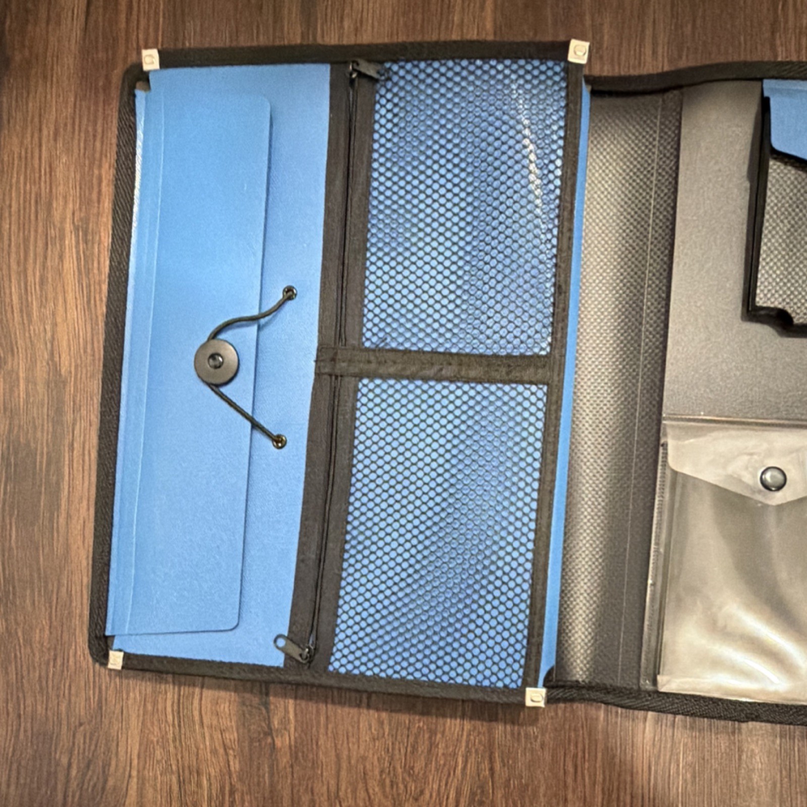 Blue and Black Organizer with Multiple Pockets and Notepad