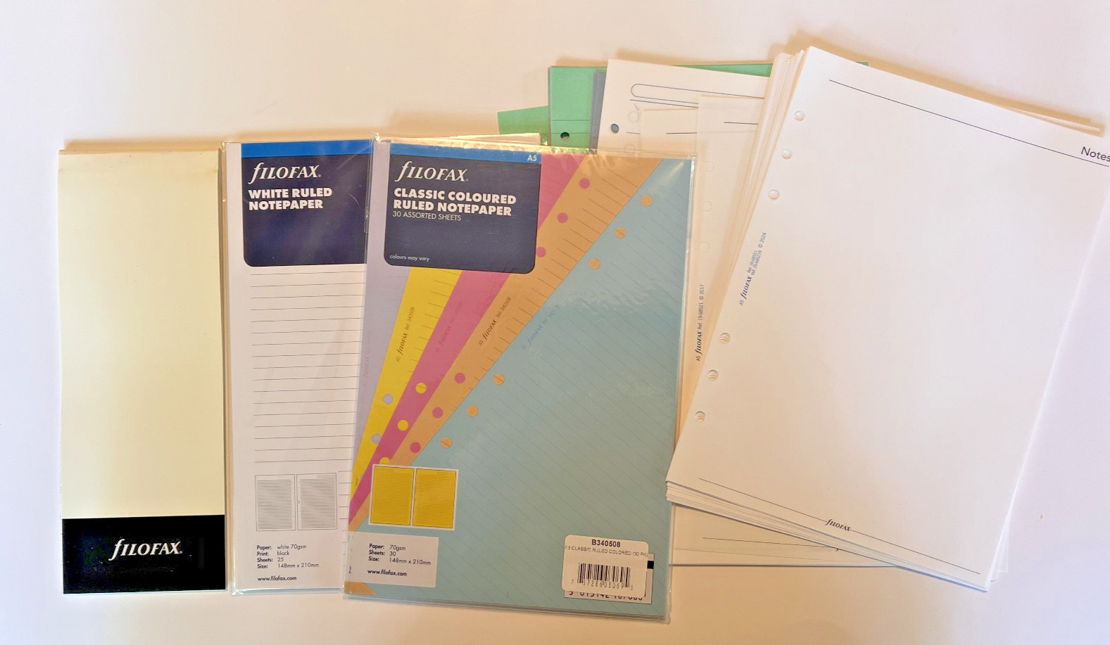 Filofax A5 paper lot White ruled lined, coloured ruled lined, and various