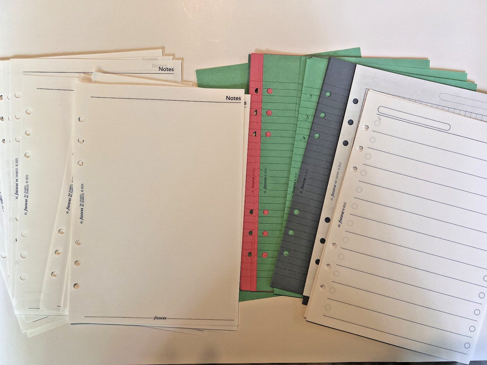 Filofax A5 paper lot White ruled lined, coloured ruled lined, and various