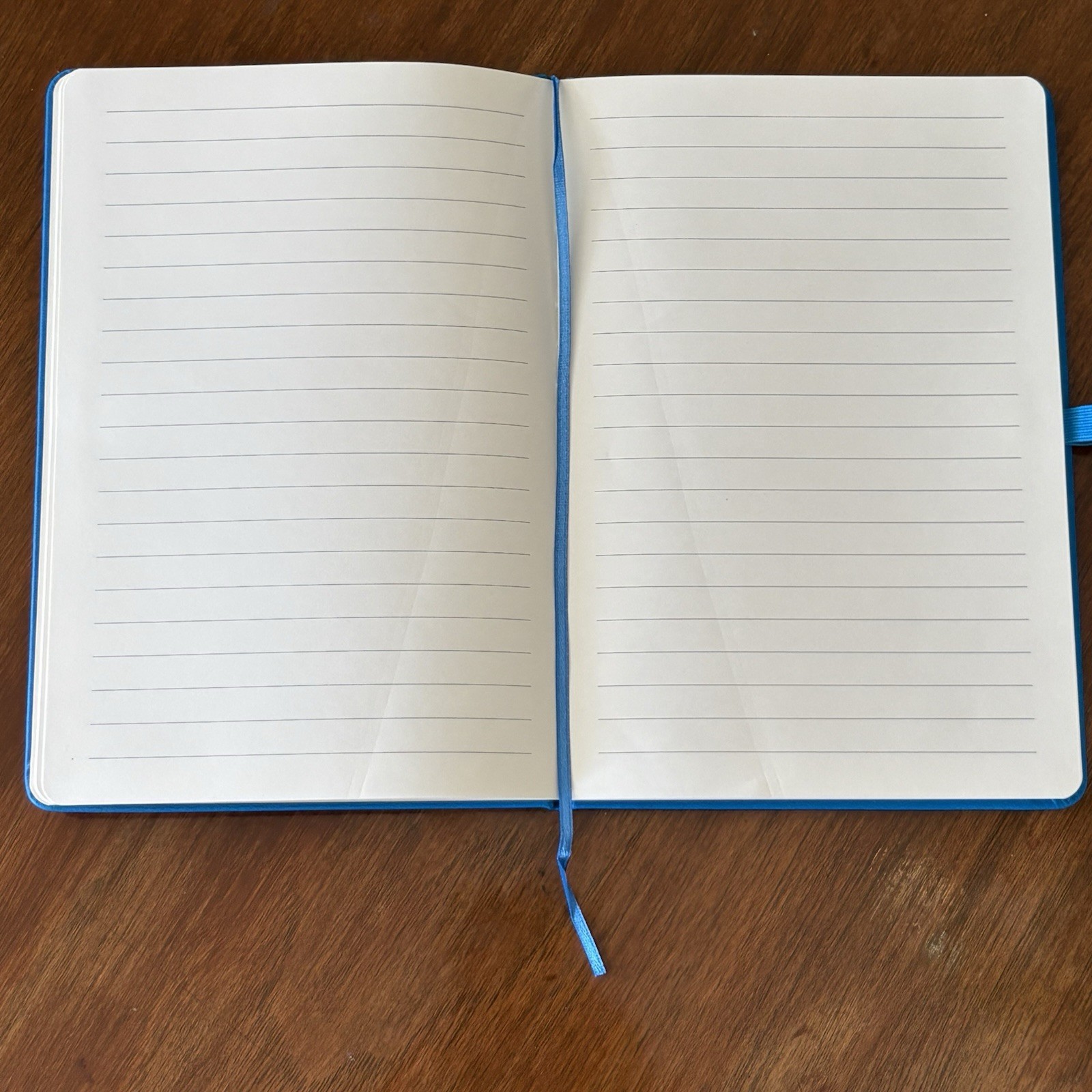50 Page Wide Rule Lined Blue Notebook with Pen Loop and Page Marker