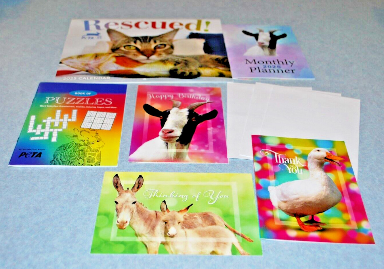 2025 PETA 8 x 10 Wall Calendar/ Monthly Planner/ Puzzle Book/Greeting Cards Lot