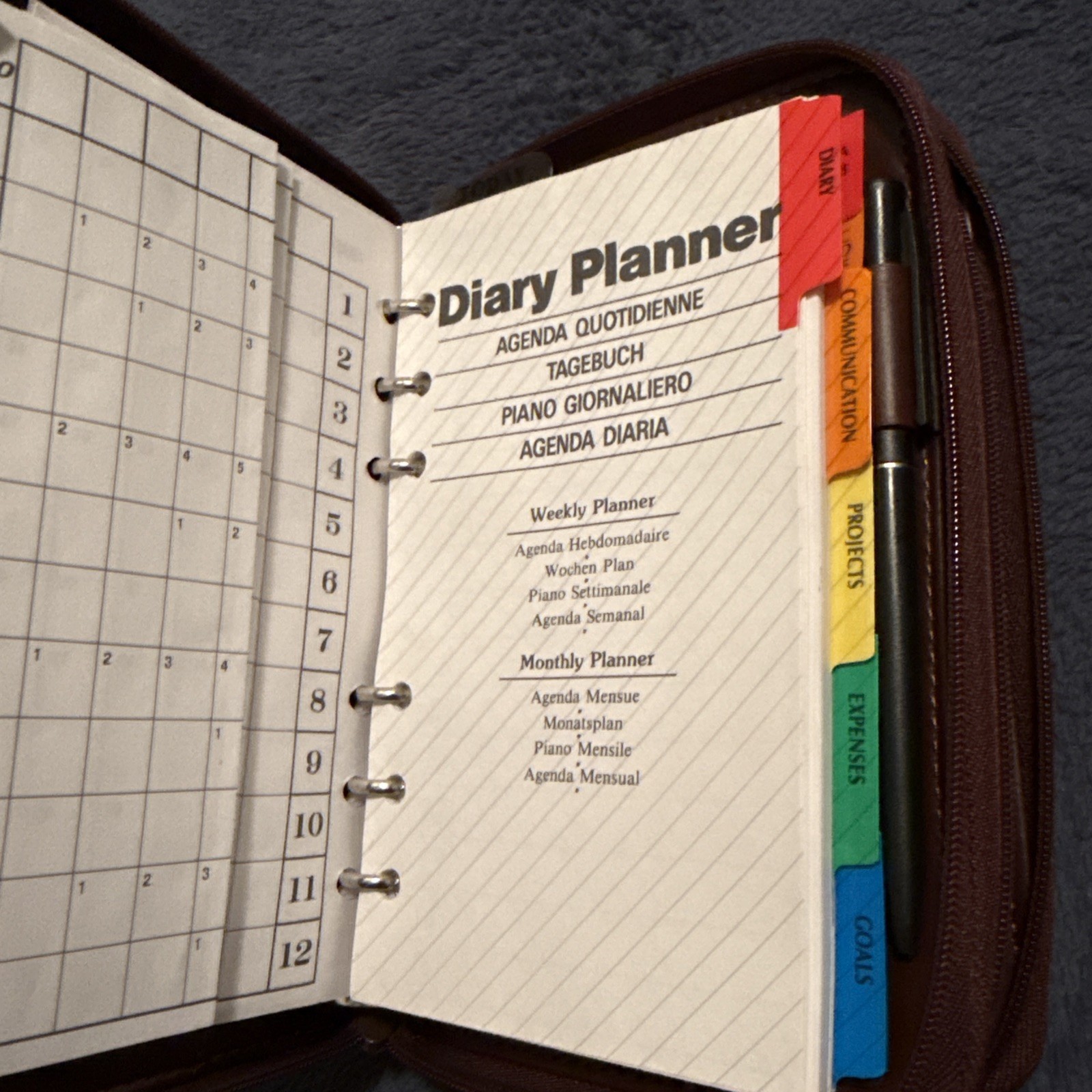 Vintage Enzo Baglioni brown zip-around day planner organizer.