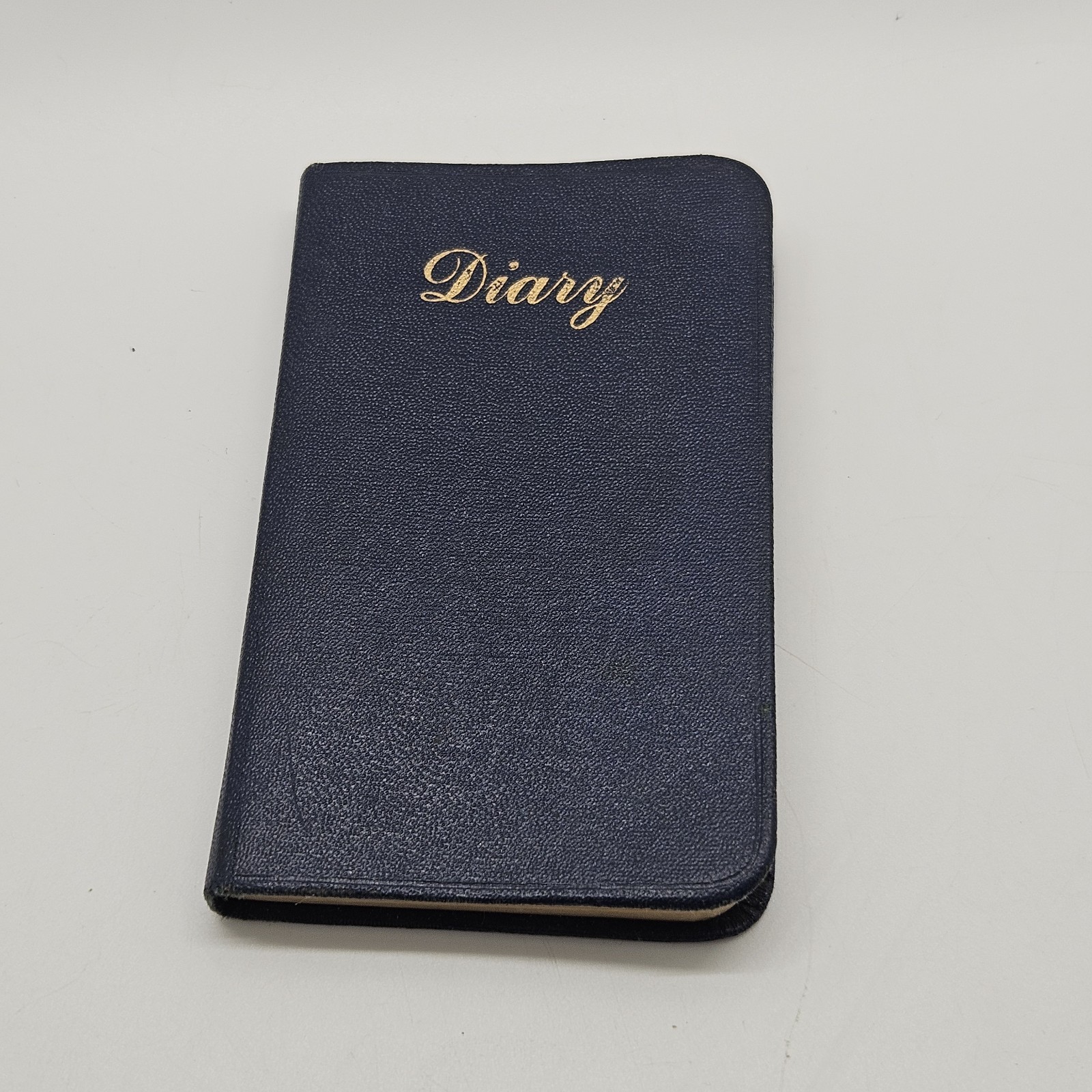 Vintage pocket diary or memorandum book with sections for appointments,…