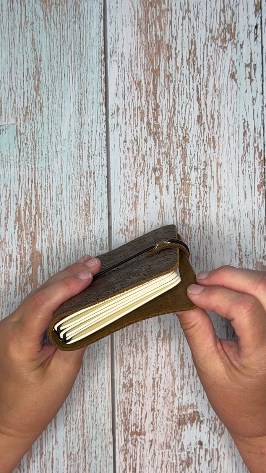 Handmade embossed brown leather pocket journal, refillable, 3 blank inserts