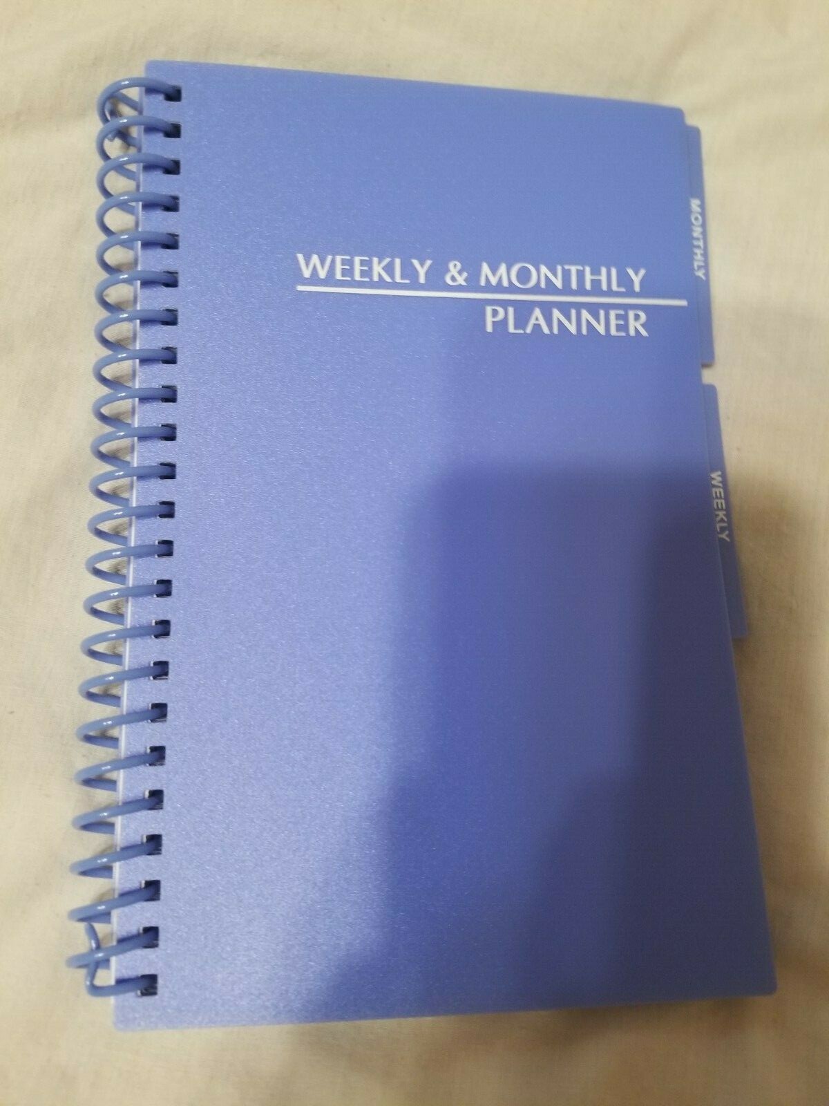 Weekly monthly planner and addresses plastic cover blue with paper no certain ye