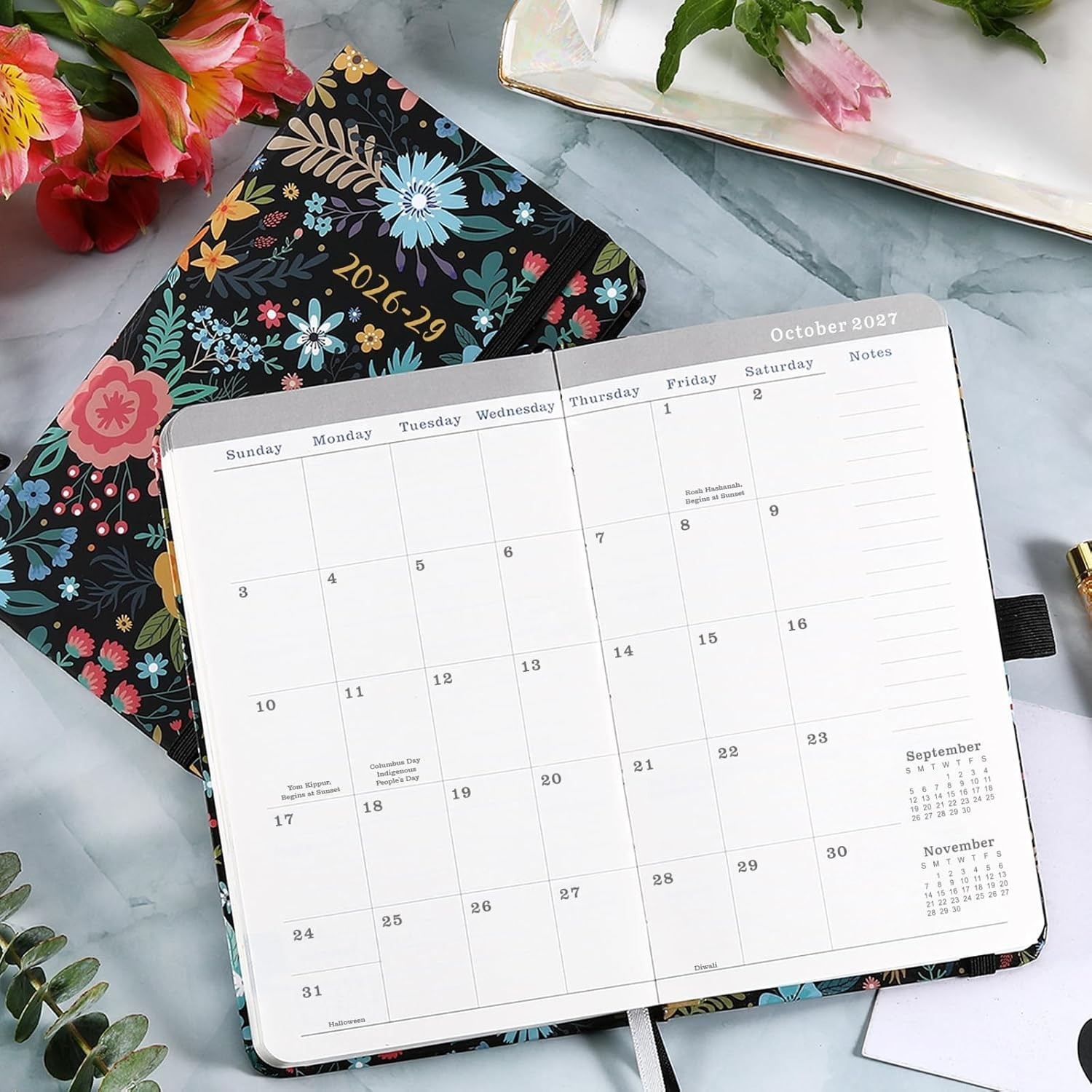 Versatile Monthly Organizer 2026-2029 with Pen Holder & Holiday Highlights