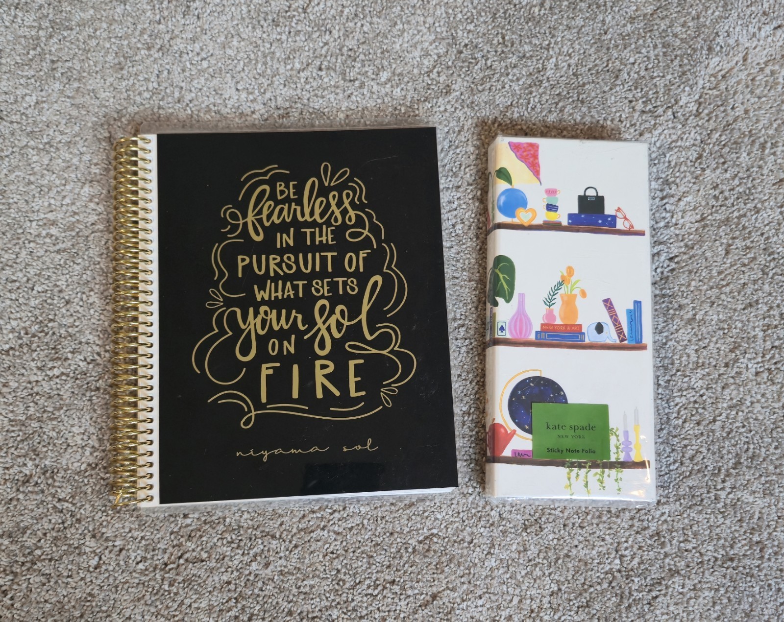Kate Spade New York & Niyama Sol spiral-bound Planner with a black cover and…