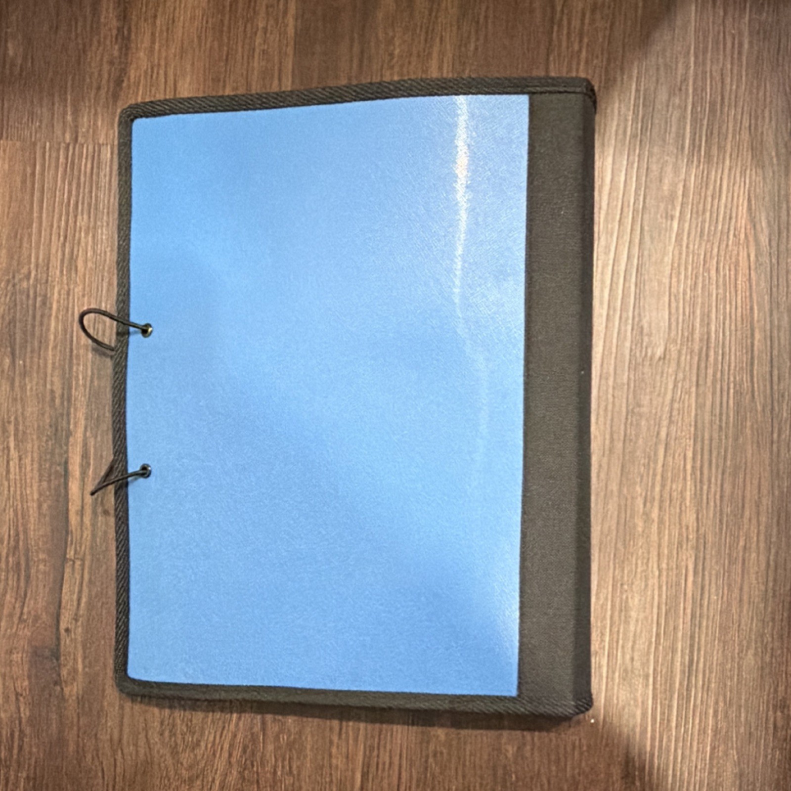 Blue and Black Organizer with Multiple Pockets and Notepad