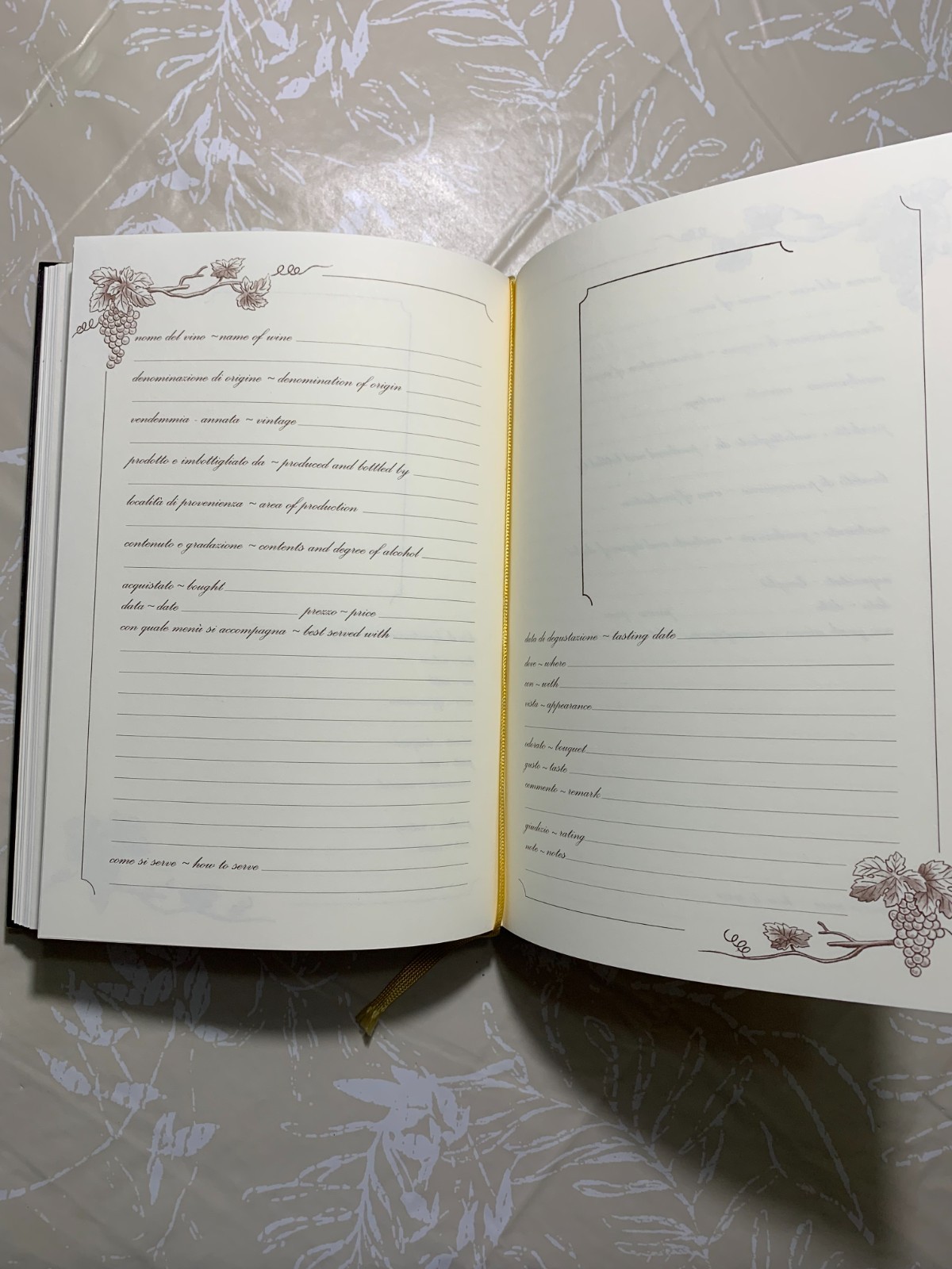 Wine log, journal, with wood and leather cover, made in Italy.