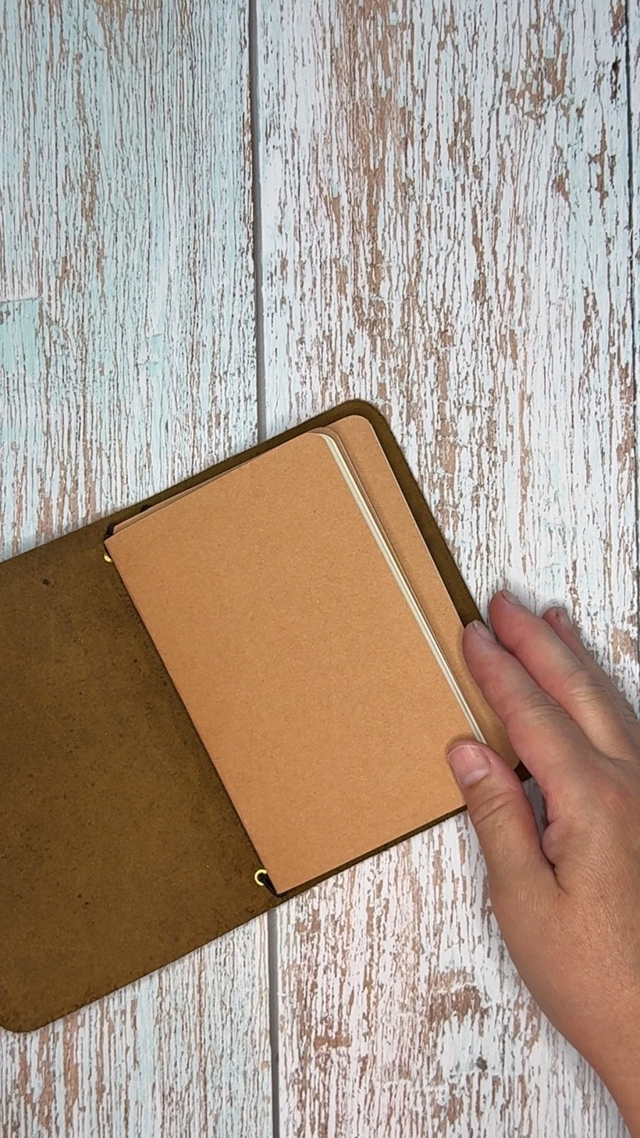 Handmade embossed brown leather pocket journal, refillable, 3 blank inserts
